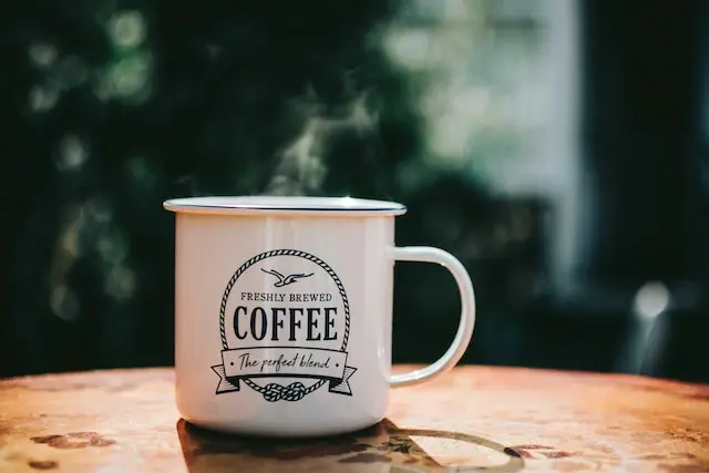 Coffee mug on a table.