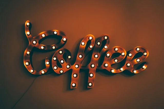 Sign with lights in it saying "Coffee".